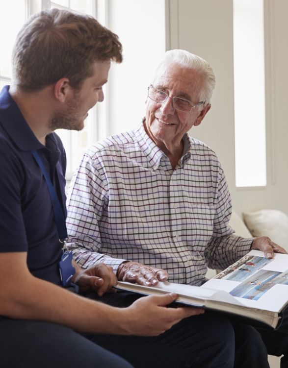 A resident reading with a family member 
